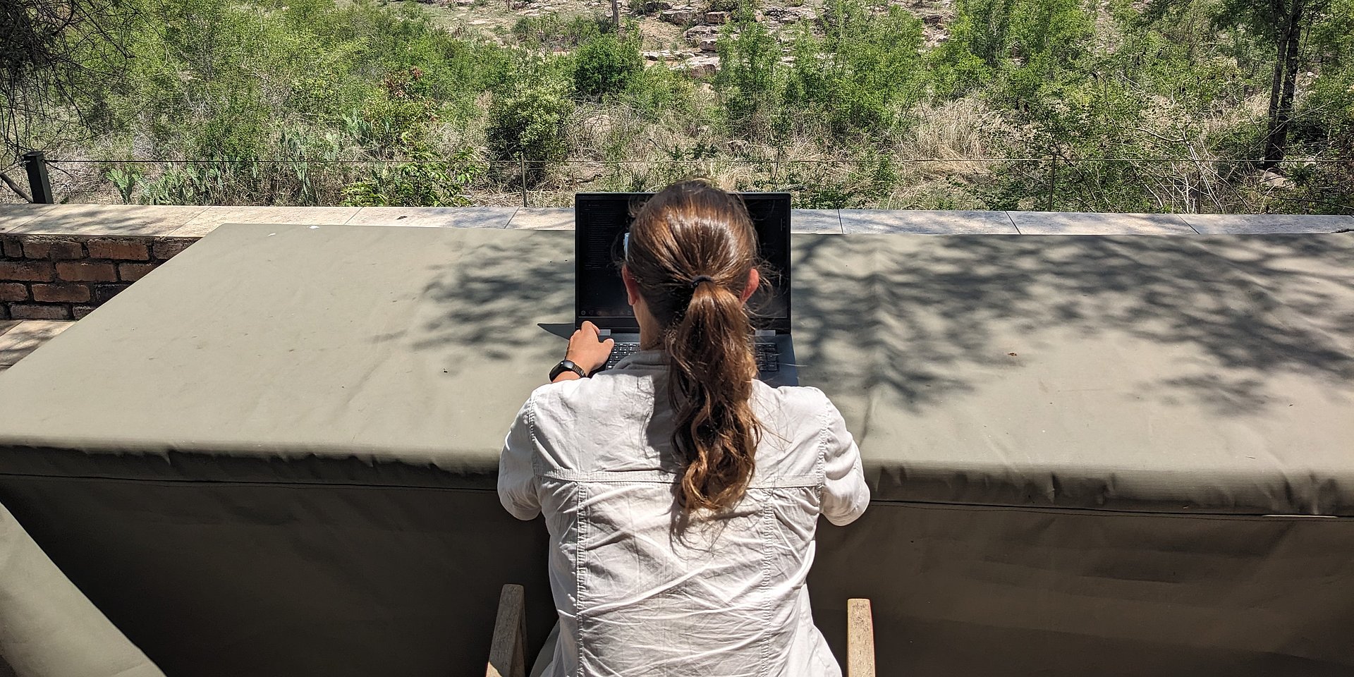 Vanessa Süßle working outdoors in South Africa.