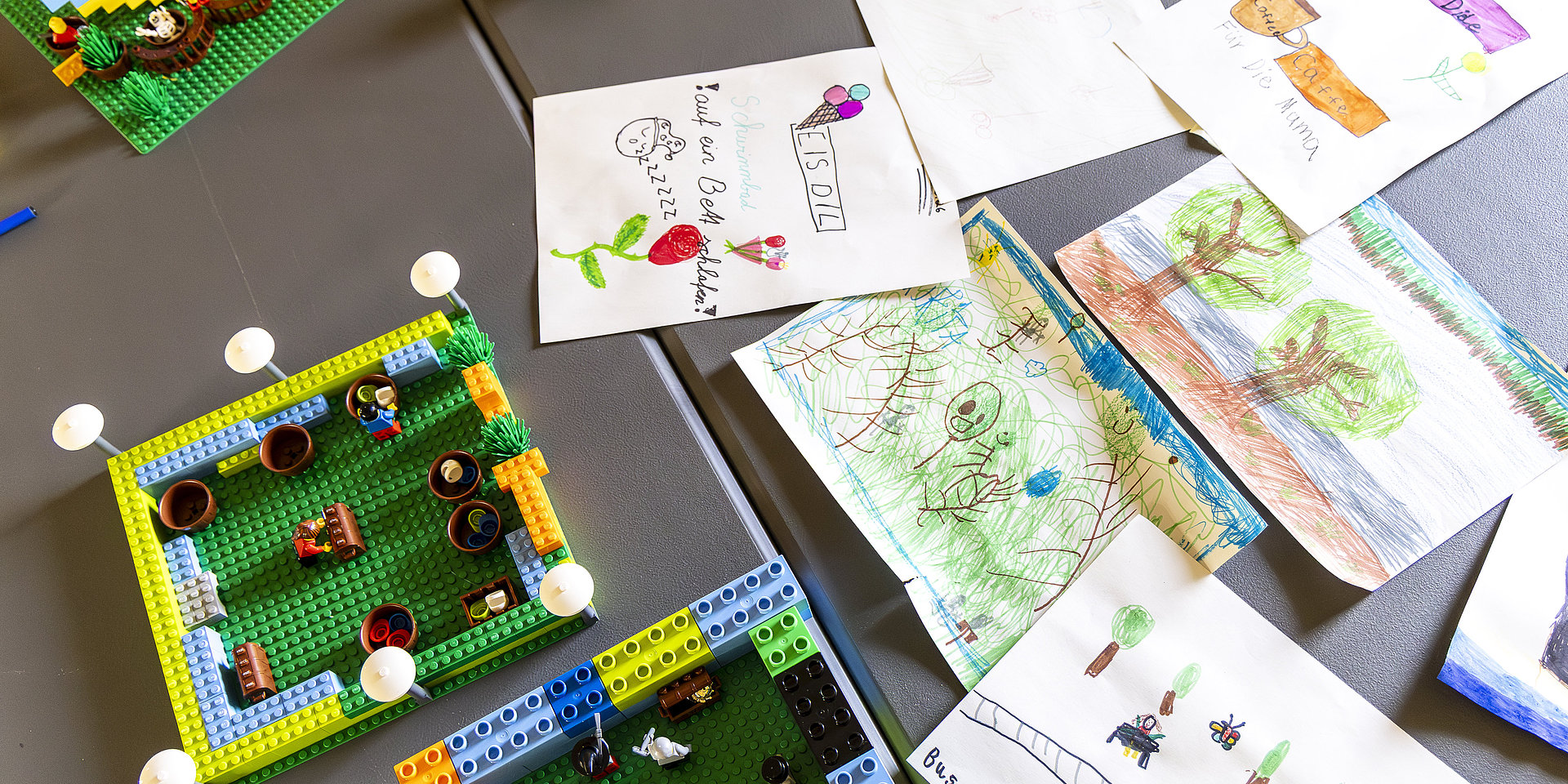 Children’s drawings and Lego models viewed from above. 